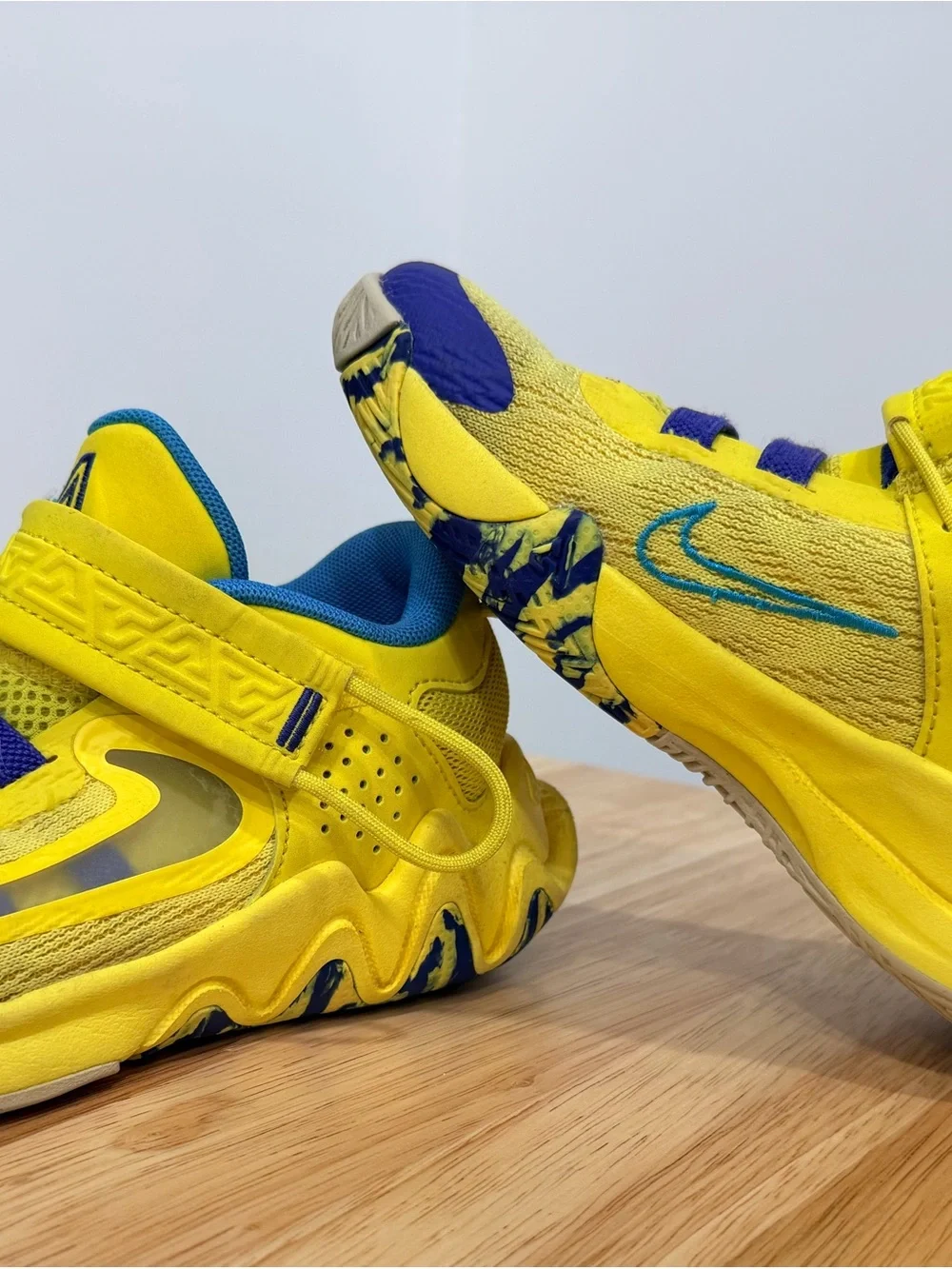 Nike Kids Yellow Sneakers with Blue Accents